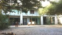 Appartamento moderno con giardino privati.