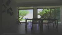 Appartamento moderno con giardino privati.