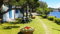 Accogliente bungalow tra lago e spiaggia